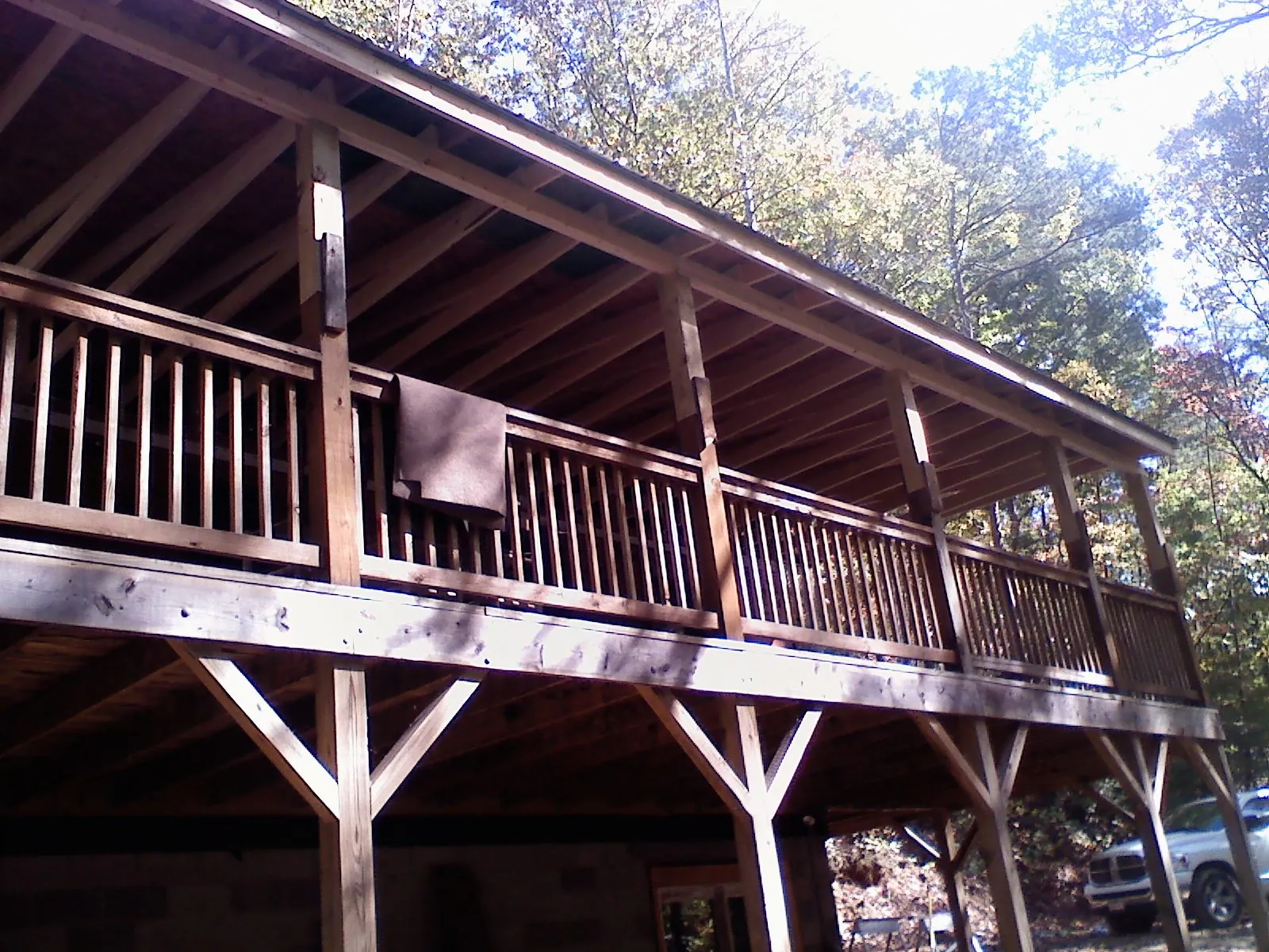 Timber framing under a new elevated porch and deck — Roof Leak Repair in Pierson by Roofing Brothers